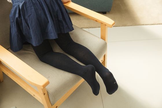 Calcetines de escuela de chicas tejidos a medida Calcetines de algodón de compresión calentados Calcetines calzados para niños