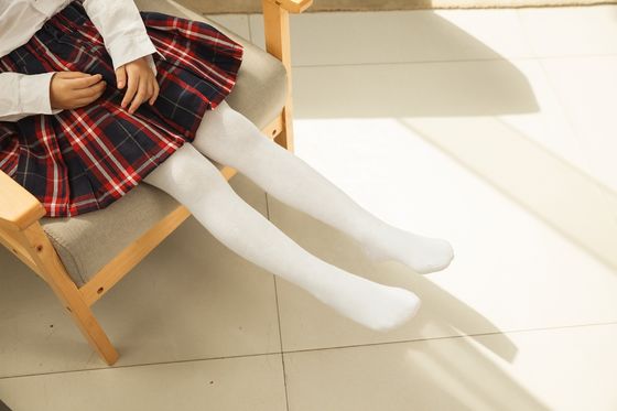Calcetines de escuela de chicas tejidos a medida Calcetines de algodón de compresión calentados Calcetines calzados para niños