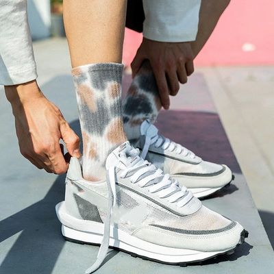 Calcetín de otoño transpirable corbata teñida moda fresca hombres mujeres calcetines de tobillo alto estilo regular