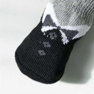 Adorables calcetines para perros de mascota con dibujos animados y diseño de punto negro Terry transpirable